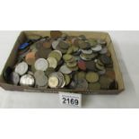 A mixed lot of foreign coins.