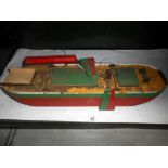 A vintage wooden model of a boat a/f length 59cm