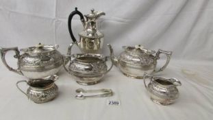 A silver plate tea set comprising 2 teapots,