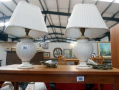 A nice pair of ivory pottery lamps,
