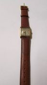 A 9ct rose gold gent's wrist watch with second hand. in working order.