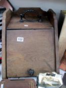 A vintage wooden coal box