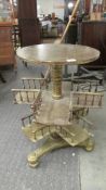 An unusual gilt wood book case/table.