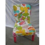 A multi coloured bedroom chair