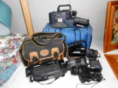 A vintage Canon VM-E1N Canonvision 8 and Hitachi VM-E54E camcorder etc.