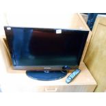 A Samsung 26" television with remote