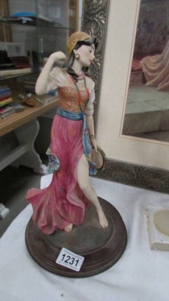 A figural table lamp and 3 figures. - Image 3 of 5