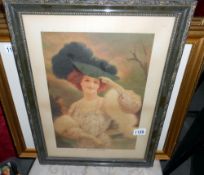 A framed and glazed picture of a lady