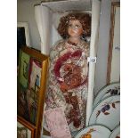 A boxed limited edition porcelain doll 'Rebecca', 138/3000.