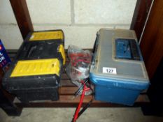 2 tool boxes with tools and a multimeter