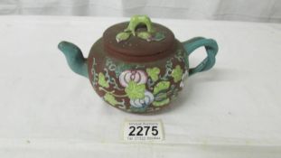 A decorative Chinese clay teapot (inside rim of lid a/f otherwise in good condition), height 9.5 cm.