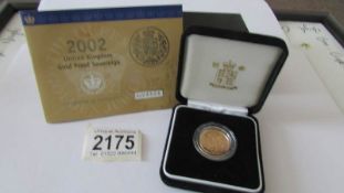 A 2002 Gold proof sovereign,
