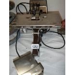 A Rapid 2 EL bench mount industrial electric stapler.