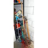 A quantity of garden tools, metal detector, drain rods, etc.