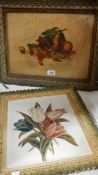 A still life painting on board and a floral painting on porcelian.