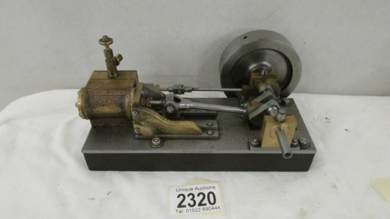 A model steam engine accessory.