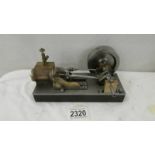 A model steam engine accessory.