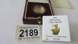 A 1992 Britannia 1/10 ounce gold coin.