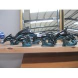 7 Poole pottery dolphins, 2 large (H 17.5cm) 1 medium (H 14.5cm) and 4 small (H 10.