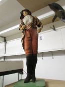 A vintage cloth costume doll, 57cm tall.
