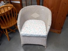 A wicker conservatory chair