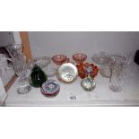 A collection of glass paperweights, trinkets etc.