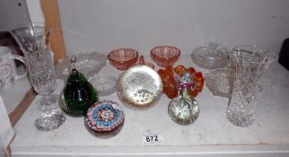 A collection of glass paperweights, trinkets etc.