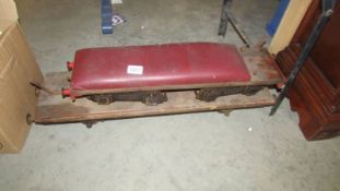 2 x 3.5" gauge rolling flat wagons, one with seat pad.