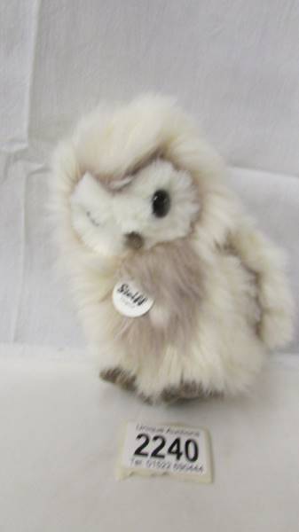 A small Steiff owl.