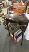 A mahogany corner table.