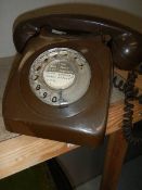 An old brown telephone.