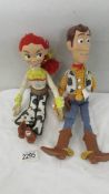 Two Disney Pixar Toy story dolls - Woody and Jessie.
