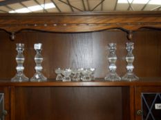 2 pairs of molded glass candlesticks and 7 cut glass spirit glasses