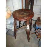 A 19th century early 20th century wooden stool with cross stretcher height 52cm