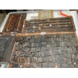 A quantity of old wooden printing blocks.