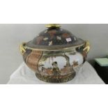 A large oriental hand painted tureen.