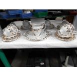 A Royal Albert 19 piece tea set and 2 Royal Albert trio's