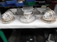 A Royal Albert 19 piece tea set and 2 Royal Albert trio's