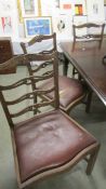 A set of 4 oak dining chairs (seats need re-covering).