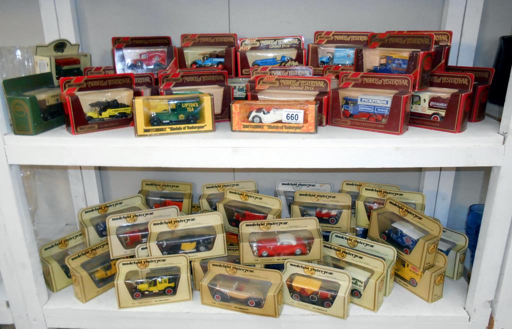 A large quantity of boxed Matchbox models of yesteryear on 2 shelves (over 40)