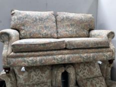 A 2 seater floral settee