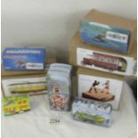 A collection of 6 boxed tin plate toys.