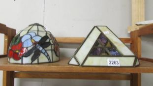 Two Tiffany style lamp shades.