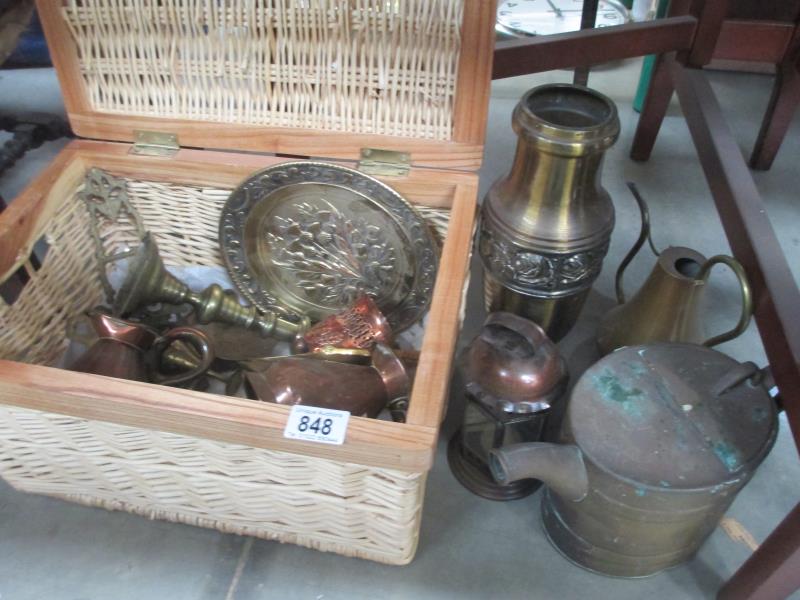 A mixed lot of brass and copper including a wicker basket