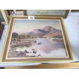 An oil on canvas lake and mountain scene, image 26 x 21, frame 32 x 28.