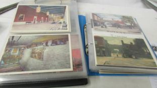 An album of Lincoln and Lincolnshire postcards together with another album of postcards.