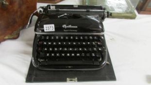 A superb vintage Optima (Made in Germany) portable typewriter in case. In absolute mint condition.