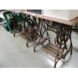 2 table made from treadle sewing machines.
