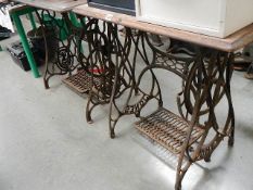 2 table made from treadle sewing machines.