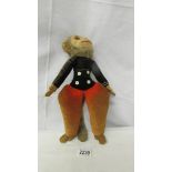 A vintage Norah Welling cloth monkey with original label, 34 cm.